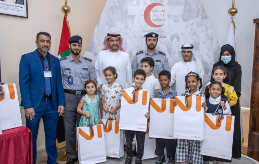 Abu Dhabi Police and Red Crescent Distribute School Gifts in Our Children Confidence Campaign